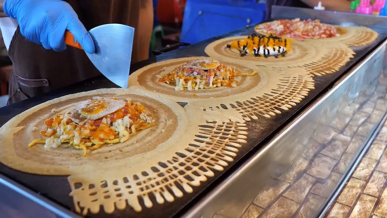 Thailand crepes with various toppings / Thai Crepes / Thai street food